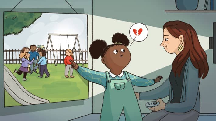 A child explains to a researcher how an excluded child in a picture feels.