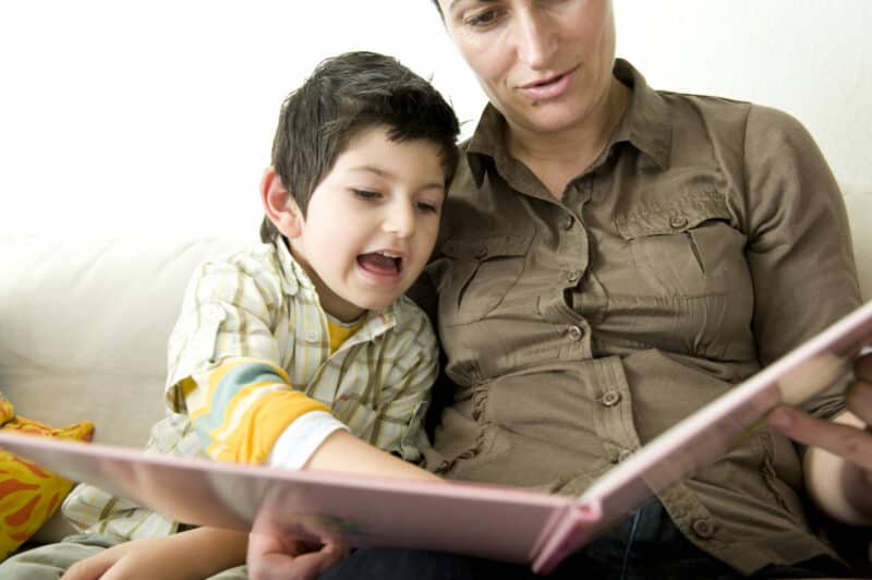 Mother reading with son