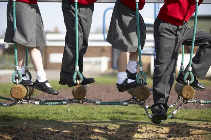 School children play in the park.