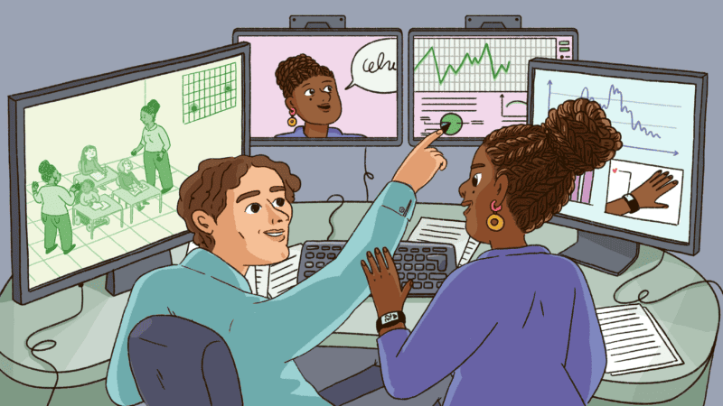 A teacher and researcher analyse data captured from the classroom.