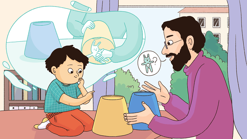 A child and an adult play a cup game with a hidden toy rabbit.